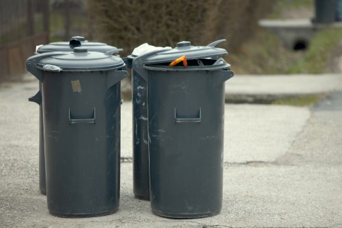 Workers wearing PPE while handling green waste