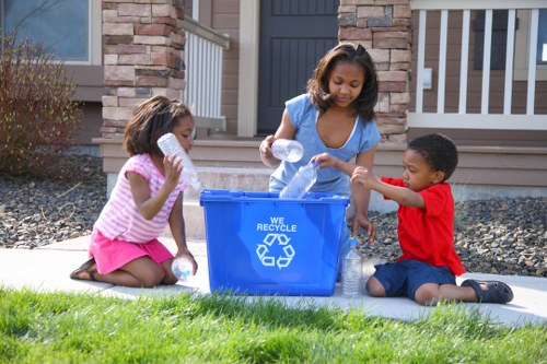 Recycling bins and labelled containers for garden waste separation
